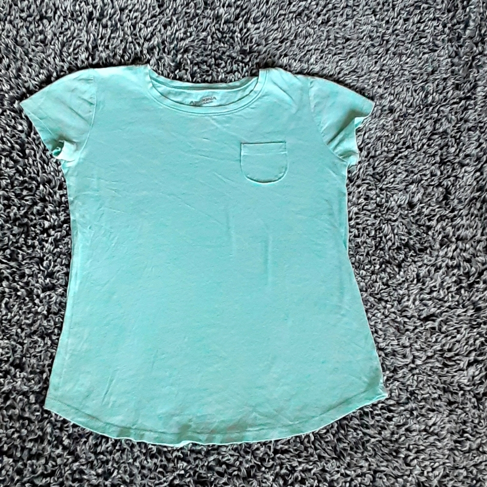 Light blue tight fitting shirt
